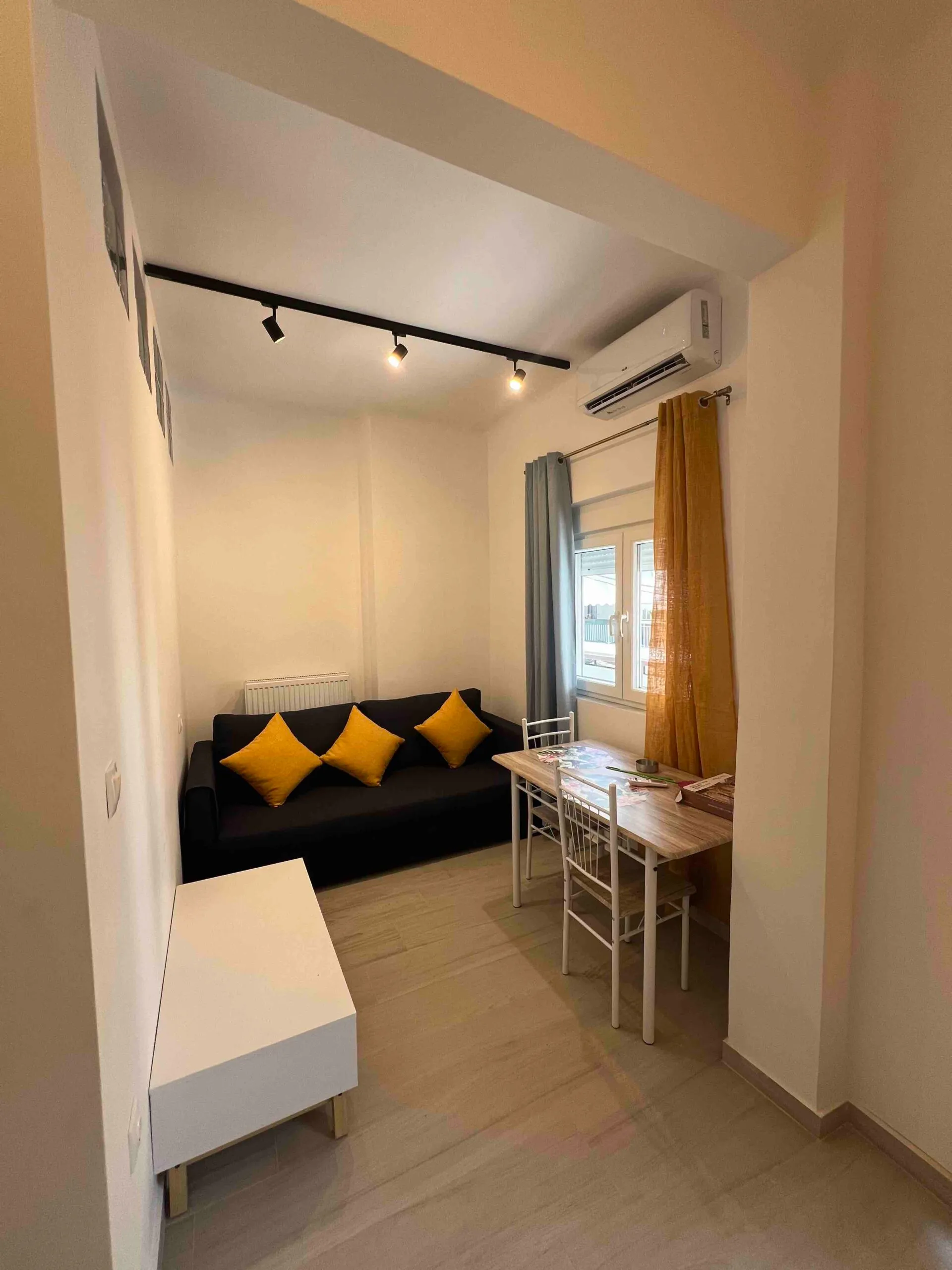 Bright, modern furnished living space in a Thessaloniki apartment